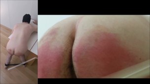 Guy’s ass whipped hard by machine with plastic strip